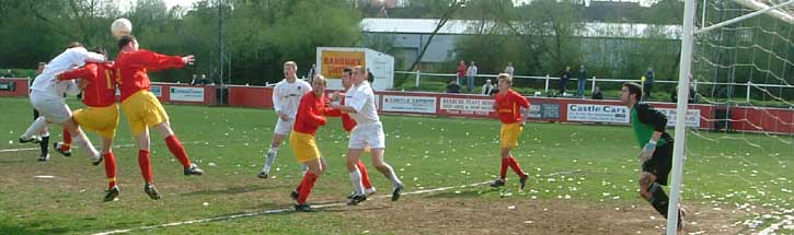 Tomkins attacks a corner.