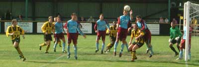 Burns challenges for a corner