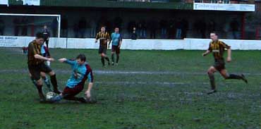 Reid on ball at Cossham Street.