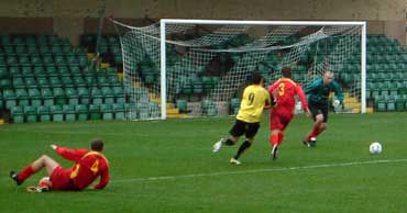 Pitcher on the attack v Banbury